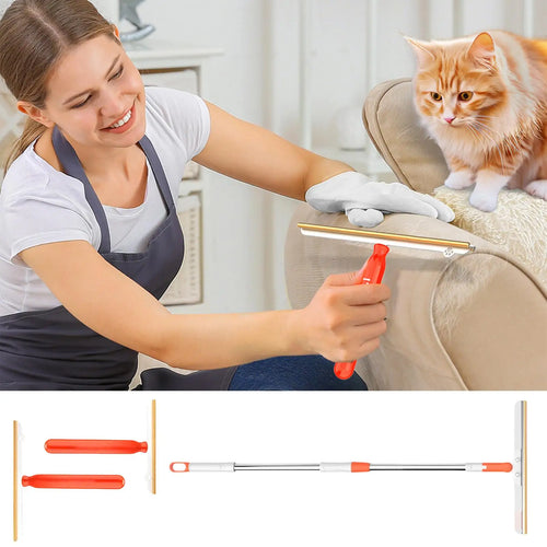Nuzzle Handheld Fur Remover in use on couch with cat